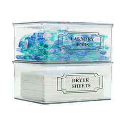 two clear plastic containers filled with blue and green glass beads on top of each other