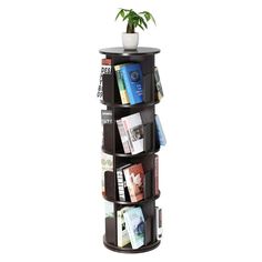 a round book shelf with several books on it and a potted plant in the corner