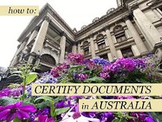 purple flowers in front of a large building with the words certify documents in australia