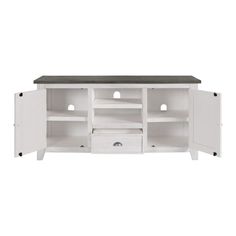 a white entertainment center with drawers and shelves