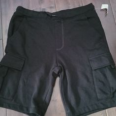 Nwt Black Cargo Shorts Black Sports Bottoms With Multiple Pockets, Black Athletic Shorts With Side Pockets And Relaxed Fit, Casual Black Shorts With Side Pockets, Black Casual Shorts With Side Pockets, Black Athletic Shorts With Pockets, Black Shorts With Hip Pockets For Streetwear, Sporty Black Cargo Shorts, Black Cotton Athletic Shorts With Pockets, Black Casual Cargo Shorts With Elastic Waistband