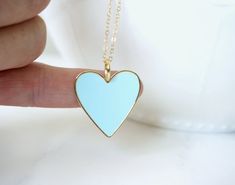 "Large Heart Necklace Pendant Anniversary Valentine's Day Your love Gift for Mom Gift for wife **This listing is for the large heart Necklace in blue or black, the model in the listing is wearing the small heart, here is the listing for the small heart necklace in blue https://www.etsy.com/listing/1014800174/gold-heart-necklace-robin-egg-blue?ref=shop_home_feat_5&pro=1 -Details Heart - 1.25\" or 28mm, approx brass and robin egg blue enamel, the back is gold and blank, not double sided Chain Blue Jewelry For Best Friend Gift On Mother's Day, Blue Heart Pendant Necklace For Mother's Day, Personalized Blue Necklaces For Valentine's Day, Blue Personalized Necklace For Valentine's Day, Personalized Blue Necklace For Valentine's Day, Blue Heart Charm Necklace For Mother's Day, Blue Heart Charm Necklace For Gift, Blue Personalized Heart Pendant Necklace, Personalized Blue Heart Pendant Necklace