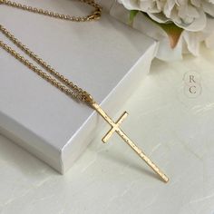 This hammered silver cross pendant is a unique fashion accessory. It perfectly embodies your faith with style. The hammered silver cross is long and refined. If you are looking for a cross jewelry piece that is both simple and sophisticated, this original design cross necklace is an excellent option. You will notice the beautiful appearance of this cross made of double-layered 925 silver with its thick rollo chain. I offer the chain in multiple lengths to customize this piece of jewelry accordin Hammered Cross Pendant Necklace For Gift, Spiritual Hammered Cross Necklace, Hammered Cross Necklace For Gift, Hammered Cross Jewelry Gift, Hammered Cross Pendant Jewelry As A Gift, Hammered Cross Jewelry As A Gift, Hammered Cross Jewelry For Gift, Hammered Cross Necklace, Pearl Necklace Outfit