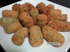 fried food on a white plate ready to be eaten