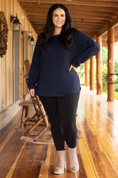 Our ALL NEW Slouchy is here!!! This navy cableknit tunic has a flattering CURVED hem, our signature dolman sleeves and long loose fit! This tunic is going to be your new go-to piece for the Fall and Winter or any time of year, really! It is seriously the softest material ever, and the neutral color makes it SO easy to style! Pair it with leggings, skinnies, booties, flats, a scarf, some glam accessories...seriously the opportunities are endless!! This comfy, cute beauty is a no-brainer!! 97% Pol Fall Leggings Outfit Plus Size, Plus Size Flannel Outfits Leggings, Comfort Stretch Leggings With Pull-on Style For Fall, Plus Size Sweater Leggings, Plus Size Slouchy Sweater, Faux Leather Leggings Outfit, Leather Leggings Outfit, Plus Size Looks, Classic Style Outfits