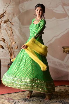 Green banarasi georgette anarkali with gota and sequins embroidery. Comes with stretch satin churidar and a yellow organza dupatta. - Aza Fashions Designer Pista Green Anarkali Set With Zari Work, Festive Georgette Anarkali Set With Zari Work, Designer Georgette Anarkali Set With Zari Work, Pista Green Georgette Anarkali Set With Gota Work, Festive Georgette Anarkali Set With Gota Work, Festival Anarkali Set With Dabka Work In Pista Green, Fitted Pista Green Anarkali Set In Dola Silk, Festive Anarkali Traditional Wear In Georgette, Festival Pista Green Anarkali Set With Dabka Work