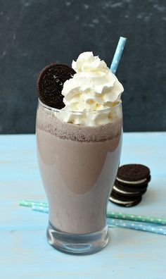 an image of a chocolate milkshake with whipped cream