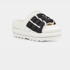 Ugg Women's Maxi Slide Logo Sandal Casual White Leather Platform Slippers, Trendy Closed Toe Synthetic Slides, Spring Outing Synthetic Flip Flops, Synthetic Platform Slippers With Rubber Sole For Spring, Spring Synthetic Slides With Round Toe, Synthetic Sport Sandals With Textured Sole For Spring, Trendy White Sandals With Rubber Sole, Casual White Sport Sandals With Textured Sole, Synthetic Closed Toe Slides For Spring