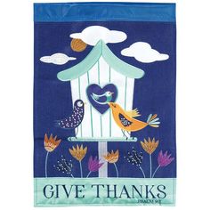 a blue banner with two birds and a birdhouse that says give thanks on it