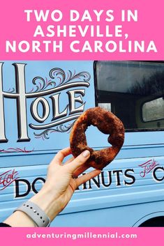 a person holding a doughnut in front of a truck with the words two days in nashville, north carolina