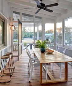 a wooden table sitting on top of a hard wood floor