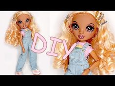 the doll is wearing overalls and has long blonde hair