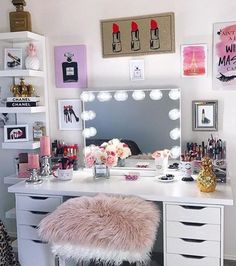 a white desk topped with a mirror and lots of drawers filled with makeup items on top of it