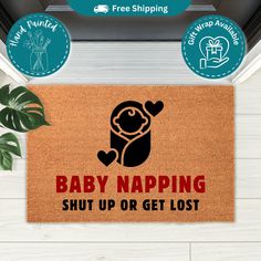 a door mat that says baby napping shut up or get lost on the floor