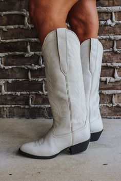 We took our quintessential cowboy boot and gave it a bit more height, resulting in a head-turning, leg-lengthening style that can go anywhere. It's just as comfortable, just as versatile, and comes with Stretch Fit, which means it expands to fit different calf sizes. Features ATS® technology provides ergonomic support on uneven terrain Stretch Fit panels under the pull tabs give an additional inch to fit a wide range of calves Removable All Day Cushioning insole Duratread™ sole provides maximum Boots White, Western Boot, Cowboy Boot, Western Boots, Leather Working, Full Grain Leather, Cowboy Boots, Turning, Womens Boots