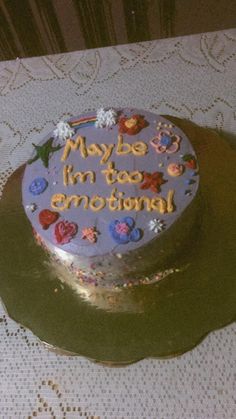 a birthday cake that says maybe i'm too emotionful on it sitting on a table