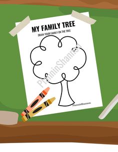 a family tree with crayons and markers on the table next to it is a piece of paper that says, my family tree draw your family on the line