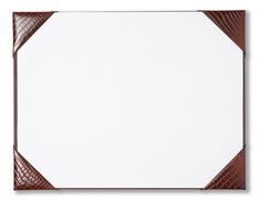 an empty white board with brown leather trim