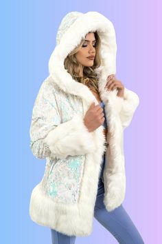 WOMEN'S PLAYA PETITE COAT FEATURES High quality faux fur. Lined with ultra cozy cuddle seal fabric. 2 Inside zipper pockets on the front sides of the coat. 2 Outside pockets to keep your hands warm. 6" Invisible zipper ID "secret" pocket on the inside left chest lining. 4 Hook & eye closures. Inside back pack straps to wear the coat like a cape when you are hot. Length is approx. 29”. Dare to stand out in a crowd in this fun & electrifying coat. You are bound to attract a lot of attention and po