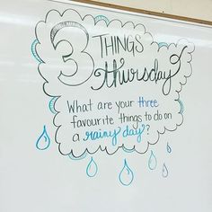 a white board with writing on it that says 3 things thoroughly what are your three favorite things to do on a rainy day?