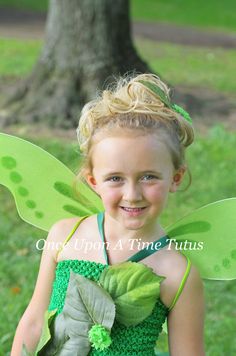 "Green Garden Fairy Tutu Dress An unlined green crochet top is 8 inches long and is embellished with leaves and flowers, shades of green tulle, and topped off with a satin ribbon halter tie. If a lined top is desired, the upgrade can be added here: https://www.etsy.com/listing/198578001/upgrade-to-lined-top?ga_search_query=lined%2Bto&ref=shop_items_search_3&frs=1 For a perfect fit, please measure around the broadest part of your child's chest. The length measurement I use for sizing is f Whimsical Spring Green Fairy Dress, Princess Style Green Fairy Dress For Spring, Spring Princess Style Green Fairy Dress, Green Fairy Dress For Spring Dress-up, Green Fairy Dress For Dress-up, Green Fairy Dress For Summer, Whimsical Green Fairy Dress For Dress-up, Green Fairy Dress For Costume Party, Fairy Style Green Dress For Costume Party