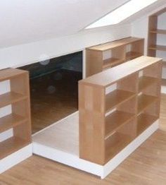 an empty room with some shelves in it