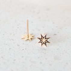 14k solid gold studs Celestial Yellow Gold Earrings Tarnish Resistant, Elegant Starburst Jewelry As Gift, Elegant Starburst Jewelry Gift, Celestial 14k Yellow Gold Earrings, 14k Gold Celestial Yellow Gold Earrings, 14k Yellow Gold Celestial Earrings, 14k Gold Star Shaped Pierced Jewelry, Elegant Starburst Earrings For Anniversary, Rose Gold Star-shaped Pierced Jewelry