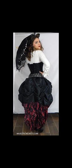 What you get: One Corset One long damask black and WINE skirt. One short black skirt. Description: Corset: 20 grommets in back. Back lacing. 14 bones. Classic Victorian damask pattern SKIRT is gathered in back to give a fabulous full look. Taffeta fabric. Can be worn down in front** or you can tie it up to show your legs. (We sell the chains to give this look). Waistband is elastic. Delicate Steampunk! You need our chains (sold separately) to hitch the skirt up in front. It can be worn down or u Fitted Gothic Costume For Cosplay Events, Black Steampunk Corset For Larp, Gothic Fitted Costumes, Black Steampunk Corset For Costume Party, Fitted Black Corset Dress For Fantasy Events, Punk Style Corset For Fantasy Events, Fitted Gothic Skirt For Costume Party, Fitted Punk Costumes For Alternative Fashion, Fitted Punk Style Costumes For Alternative Fashion