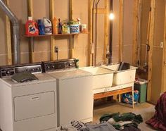 a laundry room with dryer and washing machine