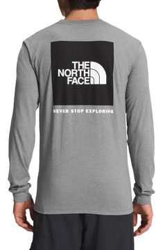 The North Face brings its Never Stop Exploring spirit to a T-shirt made of a breathable cotton blend. 27 1/2" length (size Medium) Crewneck Long sleeves 50% cotton, 50% polyester Machine wash, tumble dry Imported Outdoor Cotton Crew T-shirt, Athleisure Letter Print Tops For Outdoor, Cotton Athleisure Tops For Outdoor, Sporty Tops With Logo Print For Outdoor, Sporty Tops With Letter Print For Outdoor, Gray Crew Neck T-shirt For Outdoor Activities, Athletic Heather Long Sleeve Top With Logo, Long Sleeve Athletic Heather Top With Logo, Casual Logo Print Tops For Outdoor