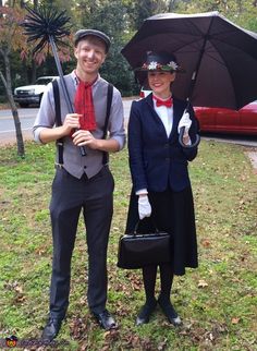 two people dressed in costumes standing next to each other