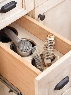 an image of a drawer with dishes in it