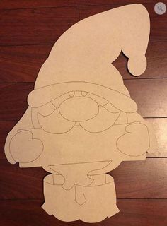 a cut out of a cartoon character on a wooden floor