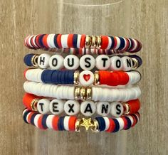 Show off your Houston Texans pride with these custom Heishi bead bracelets! 🏈✨ Each bracelet is handcrafted with team colors, featuring bold red, deep blue, and crisp white beads that capture the spirit of game day. At just $8 each, you can mix, match, and customize your stack to create a look that's uniquely yours. Perfect for fans of all ages, these bracelets are great for everyday wear or to add a pop of team spirit on game days.   Get ready to cheer on the Texans in style! Bracelets Heishi, Heishi Bracelets, Bracelet Ideas, Houston Texans, Bead Bracelets, Heishi Beads, White Beads, Team Colors, Deep Blue