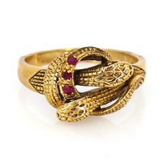 Vintage 9k Gold Double Head Snake Ring, Ruby Dual Serpent in Annular Position 9ct Yellow Gold Ring. Reptile Vintage Gold and Ruby Ring. This beautiful Victorian ring is an excellent example of goldsmith work during this period. Superb jewellery was crafted during Victorian/Edwardian times, displaying a beautiful, timeless design and craftsmanship. The ring is hallmarked for 9ct gold. This beautiful old ring style is from 1900 century , it is in lovely condition. The beautiful band and setting is Antique Hallmarked Snake Ring, 14k Gold Hallmarked Snake Ring For Anniversary, Antique Gold Snake Ring For Formal Occasions, Hallmarked Yellow Gold Snake Ring For Anniversary, Antique 14k Gold Snake Ring Gift, Antique 14k Gold Snake Ring For Anniversary, Vintage Gold Snake Ring For Anniversary, Gold Vintage Snake Ring For Anniversary, Vintage 14k Gold Snake Ring