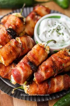 bacon wrapped skewers with ranch dip on the side