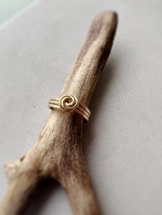 Meet the Parker Ring, a triple stack ring with a super chic top knot. Hypoallergenic All materials are 14k goldfill and with care will last a lifetime. Gold fill is 100x more bonded with gold, unlike plated gold which has a very fine dusting layer. It does not rub off or lose it’s shine and is hypoallergenic. Adjustable Midi Rings With A Modern Twist For Gifts, Modern Twist Adjustable Midi Rings As Gift, Minimalist Twisted Gold Rings, Gold Stackable Rings With A Modern Twist For Promise, Modern Twist Stackable Gold Jewelry, Gift Midi Rings With A Modern Twist, Adjustable Yellow Gold Stackable Rings With A Modern Twist, Yellow Gold Twisted Stackable Jewelry, Gold Twisted Stackable Jewelry