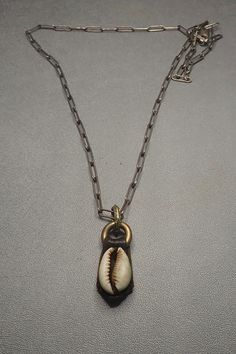 Shell with a leather protector amulet pendant on an oxidized silver links chain Length: 24" Length pendant: 1.5 Silver Link Chain, Silver Gold Jewelry, Tarnished Jewelry, Bronze Jewelry, Hand Jewelry, Oxidized Silver, Brass Jewelry, Cleaning Jewelry, Chain Lengths