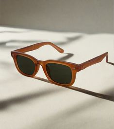 Introducing our NEW Icon sunglasses, a blend of style and functionality. The classic wayfarer style, with an amber acetate frame and green lenses, provides 100% UV protection and a stylish look. The square frame adds a touch of sophistication to any outfit. Unisex. Green Sunglasses With Uv Protection For Everyday, Classic Green Sunglasses For Everyday, Green Tinted Sunglasses For Everyday, Trendy Green Sunglasses With Tinted Lenses, Green Tinted Everyday Sunglasses, Everyday Green Tinted Sunglasses, Everyday Brown Wayfarer Sunglasses, Classic Green Wayfarer Sunglasses, Summer Green Tinted Sunglasses