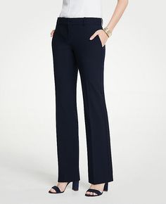 Elevate your wardrobe with the Ann Taylor Petite Trouser Pant in Seasonless Stretch - Curvy Fit. Tailored to flatter with a curvy fit that's fuller through the hip and thigh, these trousers are a staple for any professional setting. 

- Size: Petite 0
- Color: Perfect Navy
- Material: 48% Polyester, 48% Rayon, 4% Spandex
- Gender: Female
- Leg Shape: Trouser with a slight flare to elongate the legs
- Rise: Mid rise, sits 2 1/4" below natural waist
- Length: 30" inseam with a 19" leg opening
- Fe Petite Suits, Petite Dress Pants, Professional Pants, Trouser Pocket, Petite Pants, Business Outfit, Fitted Trousers, Work Wardrobe, Professional Outfits