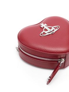 Find VIVIENNE WESTWOOD Louise Heart Mini Bag on Editorialist. The Vivienne Westwood Louise Mini Bag is crafted from faux leather with a pebbled texture. The bag features a heart motif, a signature Orb plaque detail, an adjustable and detachable shoulder strap, a main compartment, an internal logo tag, contrast lining, silver-tone hardware, and an all-around zip fastening. The bag includes a protective dust bag. The bag can be worn on the shoulder or crossbody. This item comes from a brand rated The Vivienne, Heart Motif, Fashion Wishlist, Dolce E Gabbana, Vivienne Westwood, Nike Air Jordan, A Heart, Miu Miu, Jimmy Choo