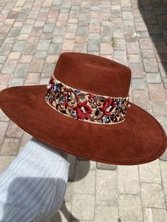 -Made in Guanajuato, Mexico -One size fits most -Stretch band to fit sizes S-L -Manmade -Shipped from Florida -15 in. L -14 in. W -6 in. H -Material felt -4 in. H Crown -Every hat is handmade and decorated to perfection, this hat has a bright beautiful bright rust color to add that wow to any outfit! -Not only will it help keep the cool with the sun, but it will bring all the attention with its bright color and small gems and pearls that will shine in the sunlight ! Vintage Hat Outfit, Embellished Cowboy Hat, Bohemian Hat, Burned Hats, Boho Hats, Boho Hat, Boater Hat, Stretch Band, Hat Box