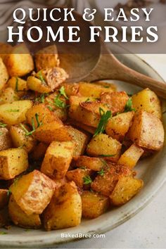 a white bowl filled with cooked potatoes and garnished with herbs