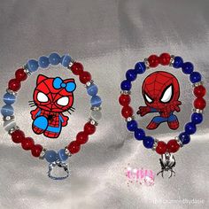 two bracelets with spiderman and red, white, and blue beads on them