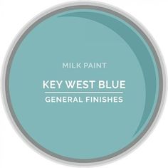 a bottle of milk with the words, key west blue general finishes