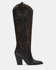 A Western boot is a requirement for any wardrobe and we’re obsessed with LASSO. This knee-high pair features whipstitching detail and a towering block heel. 3.75 inch heel height Size 6 measurements: 17 inch shaft circumference, 13.5 inch shaft height Size 8 measurements: 18 inch shaft circumference, 14.25 inch shaft height Size 10 measurements: 19 inch shaft circumference, 15 inch shaft height Leather upper material Textile and synthetic lining Synthetic sock Synthetic sole Imported Chic Black Outfits, Denim Short Jumpsuit, Chic Sweatshirt, Outfits Retro, Elegant Gothic, Half Sleeve Tops, Western Boots Women, Shoe Inspo, Block Heel Boots