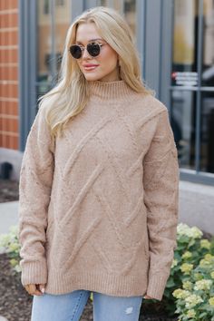 This Camel textured mock neck sweater is a versatile and stylish addition to any wardrobe! Made from high-quality materials, this sweater offers both comfort and durability. The mock neck adds a touch of sophistication. Its timeless design makes it perfect for any occasion. Simply style it with jeans, ankle booties, and simple accessories for a chic fall look. Also available in TWO other colors: White & Grey! Solid Turtleneck Sweater With Textured Knit, Chic Textured Knit High Neck Sweater, Chic High Neck Textured Knit Sweater, Chic High-neck Textured Knit Sweater, Chic High Neck Textured Sweater, Solid Cable Knit Turtleneck Outerwear, Fall Knit Mock Neck Top For Layering, Fall Layering Mock Neck Knit Top, Knit Mock Neck Top For Fall Layering