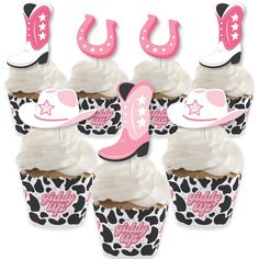 cupcakes with cowboy hats and boots on them are decorated in pink and black