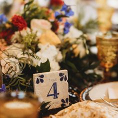 Blue and white table numbers, in the talavera aesthetic, each delicately adored with white flowers and whimsical leaves.  Enjoy these statement table numbers at your wedding, and to use afterwards in your home as a momento from your special day.   --->  (Images are mock ups of a new design that has not been made yet which is why you cannot see the stone pigment and why you can see layering.  One completed, all white/grey background will be stone color and the beige background will have some stome texture). Each table number is a 4"x4" stone tile made from either travertine or marble stone.  This listing is for 10 table numbers.  If you want more or less please message me for a custom order request.  On the back of each tile I can customize a personal logo with your names and the date of th Wedding Table Decorations Aesthetic, Talavera Table Numbers, Ceramic Table Numbers, Clase Azul Wedding, Blue And White Talavera Wedding, Blue Talavera Wedding, Blue And White Mexican Wedding, Mexican Talavera Wedding, Talavera Wedding Decor