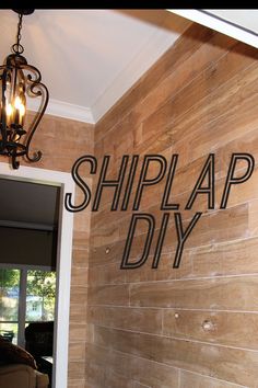 a sign that says shiplap diy on the side of a wall next to a door